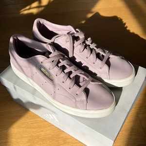 Adidas sleek sneakers in purple leather, size 8.5, gently used in good condition